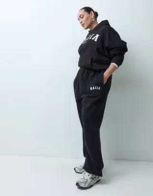 Plus cotton blend embroidered logo cuffed joggers co-ord in black