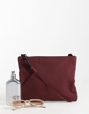 festival tech crossbody bag in burgundy
