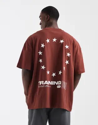 heavyweight cotton oversized t-shirt with back graphic and quick dry finish in rust