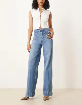 ASOS DESIGN Tall high waist wide leg jeans with front pockets inu00A0mid blue