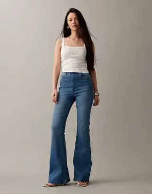 power stretch sculpt flare jeans in mid blue