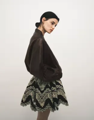 washed leather look oversized bomber jacket in brown