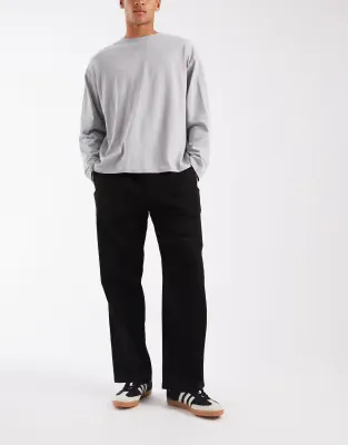 crinkle loose trousers in black