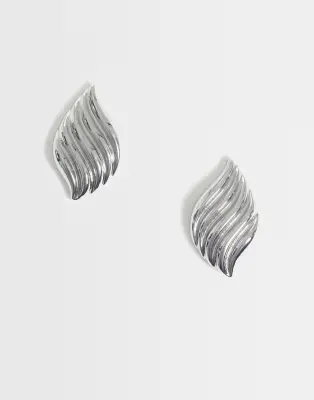 everyday stud earrings with ridge wave design in silver tone