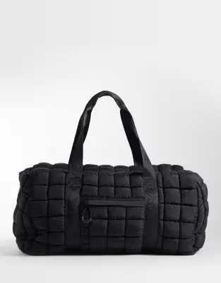 oversized quilted woven gym holdall in black
