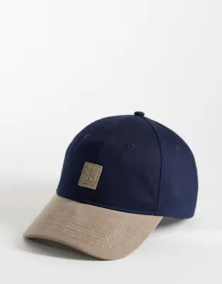 mixed colour block cap in dark blue and beige