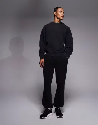 Icon Rest Day heavyweight 440gsm cotton cuffed jogger with zip pockets in washed black