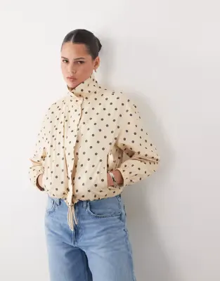 scallop detail rain jacket in choc polka dot