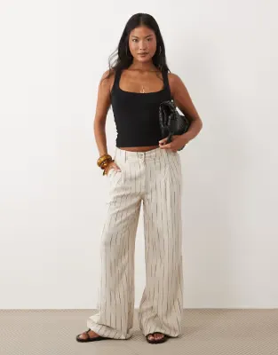 ASOS DESIGN Petite wide leg trousers with pleat detail in linen blend in natural squiggle