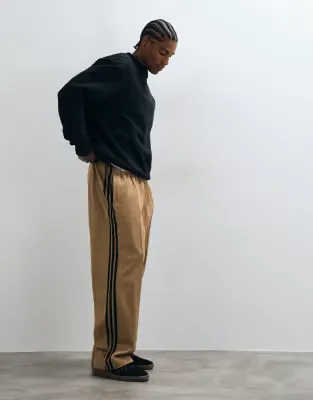 Firebird track pants in beige