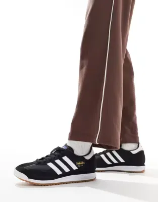 SL 72 RS trainers in black and white