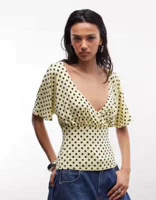 wrap cinch waist top in micro polka dot in yellow