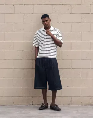 oversized striped polo in cream and black