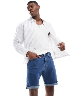 turn up denim short in mid blue denim