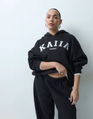 Plus cotton blend sport embroidered logo oversized hoodie co-ord in black