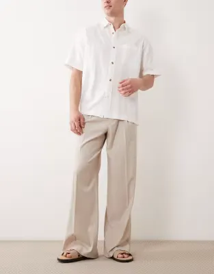 tailored loose leg trousers with front pleat in stone