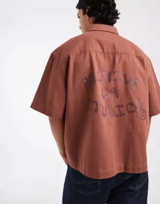 boxy oversized half sleeve twill shirt with back print in brown