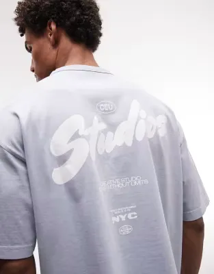 heavyweight boxy oversized t-shirt with bubble text graphic in washed light blue