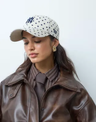 X ASOS exclusive 9forty NY Yankees polka dot cap in cream/navy