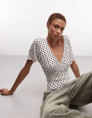 wrap cinch waist top in micro polka dot