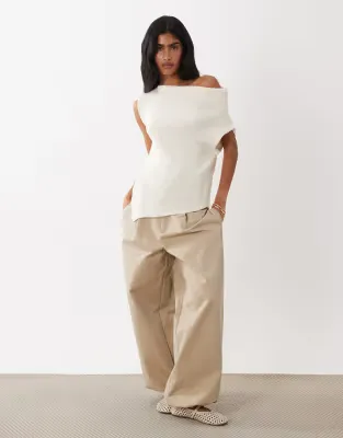 sleeveless asymmetric knitted top in white