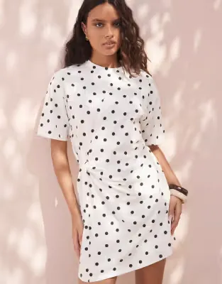 wrapped waist mini dress in mono polka dot