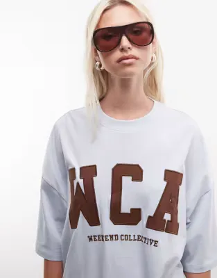 Weekend Collective Icon oversized t-shirt with WCA graphic in blue and brown